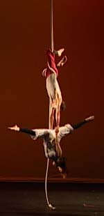 James Jay with Melissa Kerber on the vertical rope, performing with Circus Contraption.